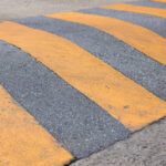 For Smooth Rides, Safe Roads speed bumps for asphalt installation by Commonwealth Paving