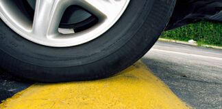 Enhance Safety and Traffic Control: Installing Speed Bumps for Asphalt Parking Lots