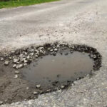 How Weather Conditions Affect Pothole Repair: Best Practices for Every Season