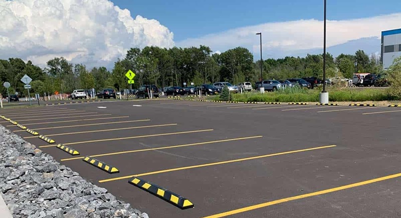 Parking Bumpers vs. Wheel Stops: Which Option Provides Better Protection?