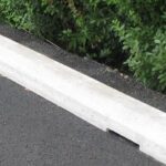 Parking Bumpers: Essential Safety and Organization Solutions by Commonwealth Paving