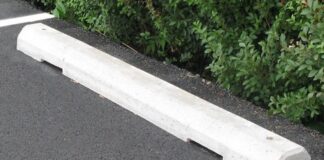 How Parking Bumpers Help Prevent Vehicle Damage and Property Collisions